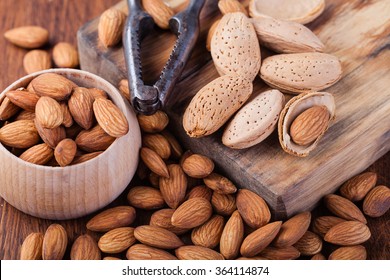 Almonds Nuts On A Wooden Table