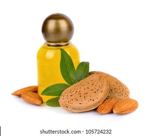 Almonds oil with nuts on white