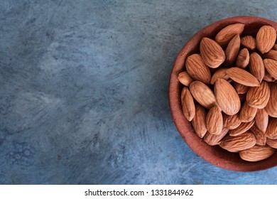 Almonds On Red Clay Pot, Almond Royalty Free Stock Images