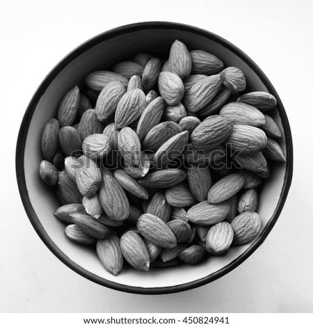 Similar – Image, Stock Photo Wooden background with almonds and chia seeds