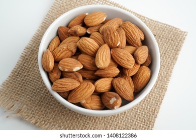 badam images stock photos vectors shutterstock https www shutterstock com image photo almonds white bowl brown fabric on 1408122386