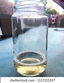 Almost Empty Beer In Glass Jar