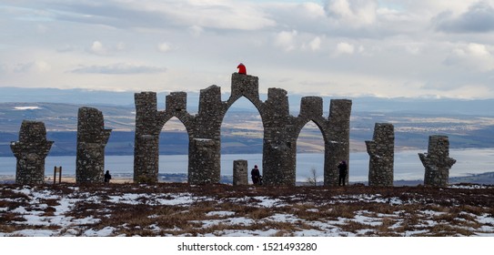 Alness / United Kingdom - March 2013: Tourists At The Fyrish Monument Near Alness In The Scottish Highlights, United Kingdom.