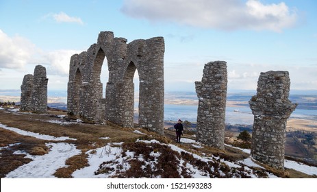 Alness / United Kingdom - March 2013: Tourists At The Fyrish Monument Near Alness In The Scottish Highlights, United Kingdom.