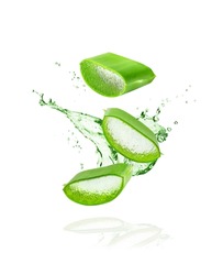 Aloe Vera Isolated On White Background. Leaf Of Aloe Vera Plant And Splash Of Juice Or Gel. Natural Essence For Herbal Beauty Products, Cosmetology, Dermatology, Naturopathic Medicine.
