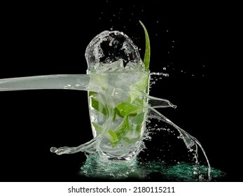 Aloe Vera Juice Glass Splash On Black Background