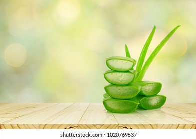 Aloe Vera On Product Display Wood Counter Background.