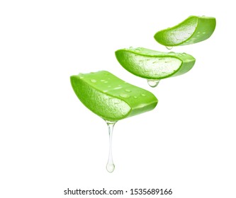 Aloe vera sliced leaf with dripping gel isolated on white background.