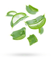 Aloe Vera Slices Flying Composition On White Background. Skin Care Concept