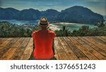 alone boy looking landscape at phi phi islands, thailand