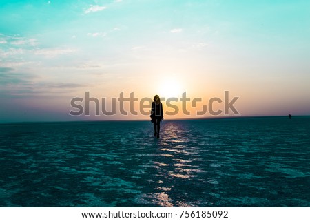 Similar – woman beach sunset horizon