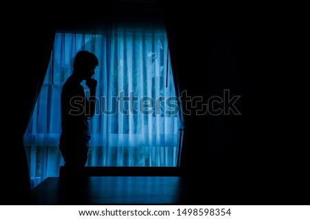 Similar – silhouette of man with poster that puts love