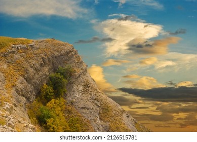 alone mount at the evening on  dramatic sky background