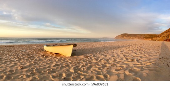 An Alone Rowboat At Virgin Mediterranean Seashore Landscape Panaroma In Skikda, Algeria