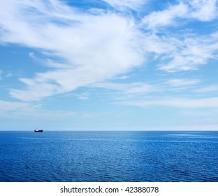 Alone ship in blue sea - Powered by Shutterstock