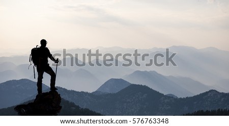 alone at the summit climber & successful climbers Stockfoto © 