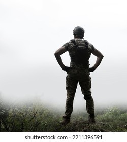 Alone Tired Young USA Nato Male Guy Stand Rest Hand Hip Waist Look Hope Protect Danger Fog Mist Smoke Field White Sky Text Space Lone Sad Worry Feel Upset Lost Vet Medic Hero God Faith Worship Concept