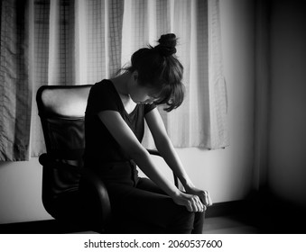 Alone Woman Sitting On Chair In Room. Black And White Image. She Sad And Cry From Life Love And Financial Problems. For   Break My Heart Love, Pain, Sad. Broken Heart. Heart Couple Or Poster. 