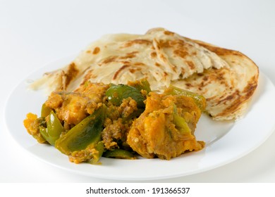 Aloo Capsicum, Potato And Bell Pepper Vegetarian Curry, Served With Paratha Fried Flatbread In The Traditional Way, Side View