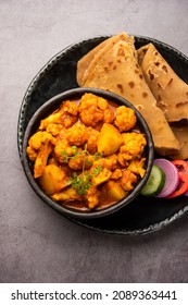 Aloo Gobi Masala Curry With Chapati Or Paratha