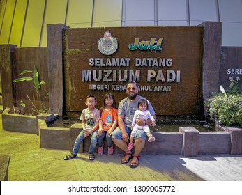 Alor Setar, Malaysia - January 25, 2019: Malay Family Taking Photo In Front Of The Enterance At Muzium Padi (Paddy Museum) In Kedah.