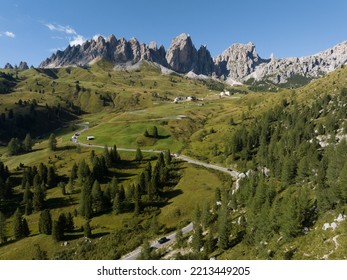 Alp Adventure Road Hair Pin Twisty In The Dolomites, Italy. Aerial Drone Overview. Driving Route Rally Cars And Traffic Passing Over A Mountain Range. Overhead.