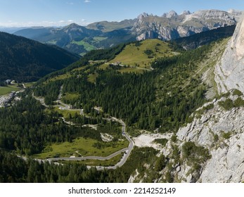 Alp Adventure Road Hair Pin Twisty In The Dolomites, Italy. Aerial Drone Overview. Driving Route Rally Cars And Traffic Passing Over A Mountain Range. Overhead.