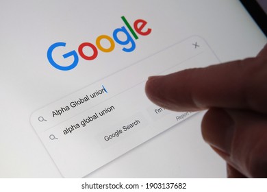 Alpha Global Union Words Seen Typed In Google Search Bar On The Tablet Screen. Alphabet Workers Are Announcing Alpha Global, A New Global Union Alliance. Stafford, United Kingdom - January 26 2021.