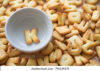 Alphabet Biscuit In Ceramic Cups (Closeup Letters K), Random Letters