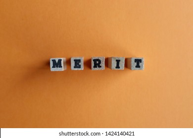 Alphabet blocks, wood texture, MERIT                                - Shutterstock ID 1424140421