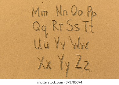 Alphabet drawn on the sand of a beach. (part two of two - from Mm to Zz)