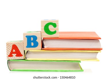 Alphabet Letter ABC Blocks For Kids On Books Isolated On White Background