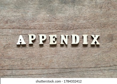 Alphabet Letter Block In Word Appendix On Wood Background