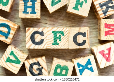 Alphabet Letter Block In Word CFC (abbreviation Of Chlorofluorocarbon) With Another On Wood Background