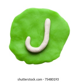 Alphabet letter using plasticine and clay. Letter J
