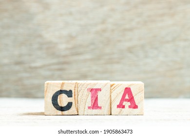 Alphabet Letter In Word CIA (abbreviation Of Certified Internal Auditor) On Wood Background