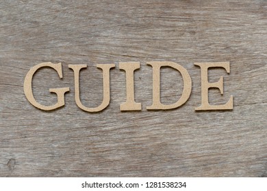 Alphabet Letter In Word Guide On Wood Background