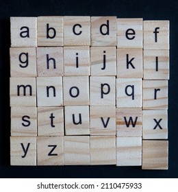 Alphabet Letters On Wooden Scrabble Pieces, Close Up