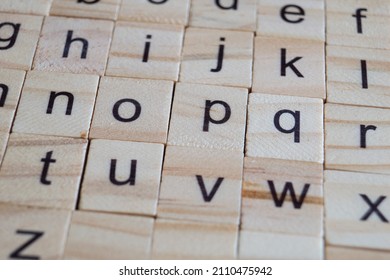 Alphabet Letters On Wooden Scrabble Pieces, Close Up