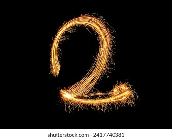 Alphabet and Number two sparklers on black background by light painting.number 2 sparkling golden for party and Celebrate. - Powered by Shutterstock - Get 15% off with code: PIKWIZARD15