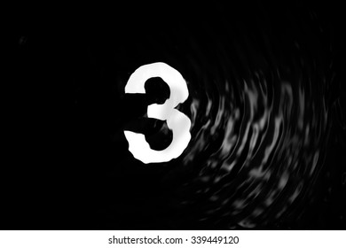 Alphabet number under water wave and water splash,number 3