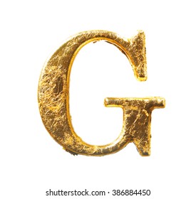 Alphabet And Numbers In Gold Leaf Isolated On White