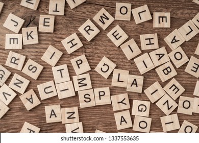 alphabets on wooden cubes as a background