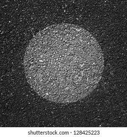 alphalt texture background with a circle