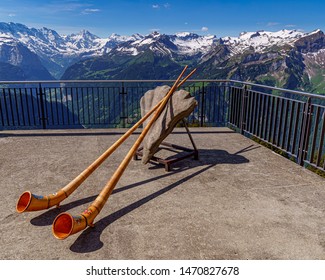 Alpine Horn With The Swiss Alps In The Background