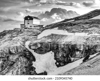 Alpine hut 2333m, in Dolomites, Italy. Landmark stop for climbing the peaks of Dolomites Alps. BW, Black and white,