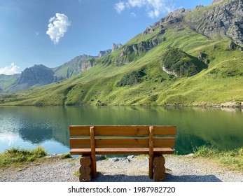 The alpine lake Melchsee or Melch Lake in the Uri Alps mountain massif, Kerns - Canton of Obwalden, Switzerland (Kanton Obwald, Schweiz)