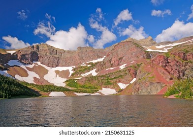 Alpine Lake In The Summer Sun On Lake Okatomi In Glacier National Park In Montana