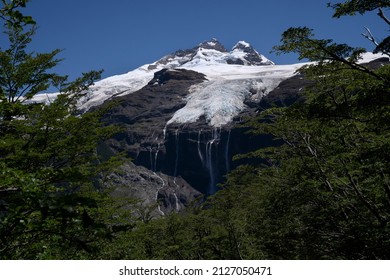 Alpine Landscape. View Of Glacier Castaño Overo White Ice Field And Tronador Hill Rocky Mountaintop In Patagonia Argentina. 