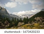 alpine mountain landscape with clouds
